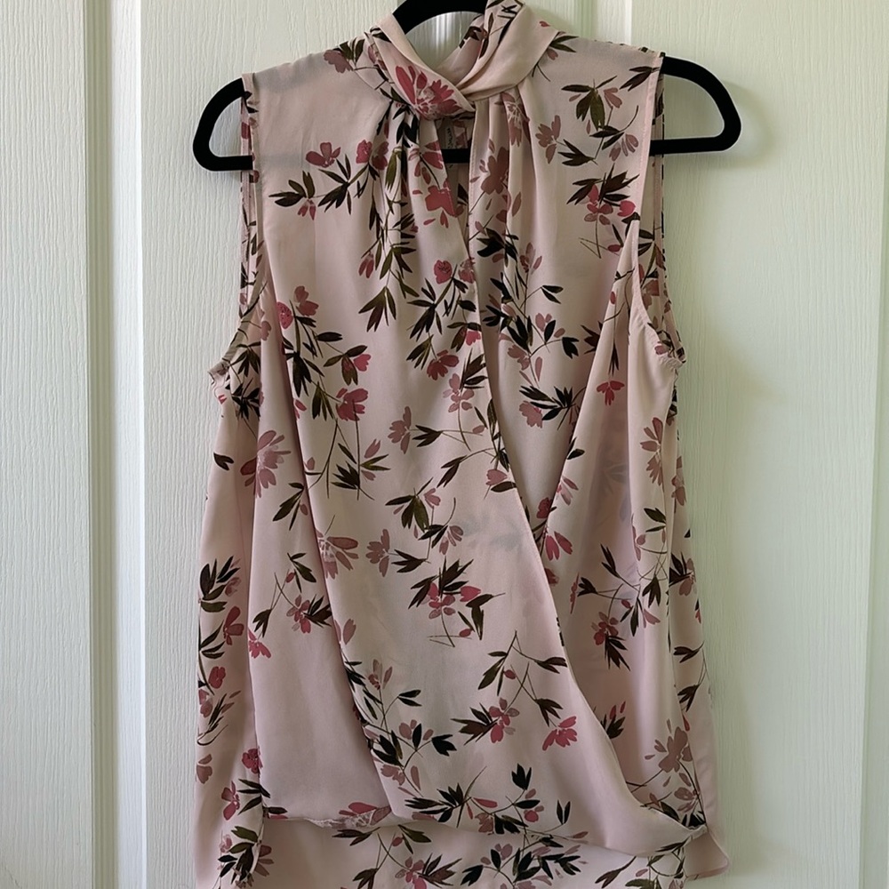 Unique blouse with twisted collar and cross over front